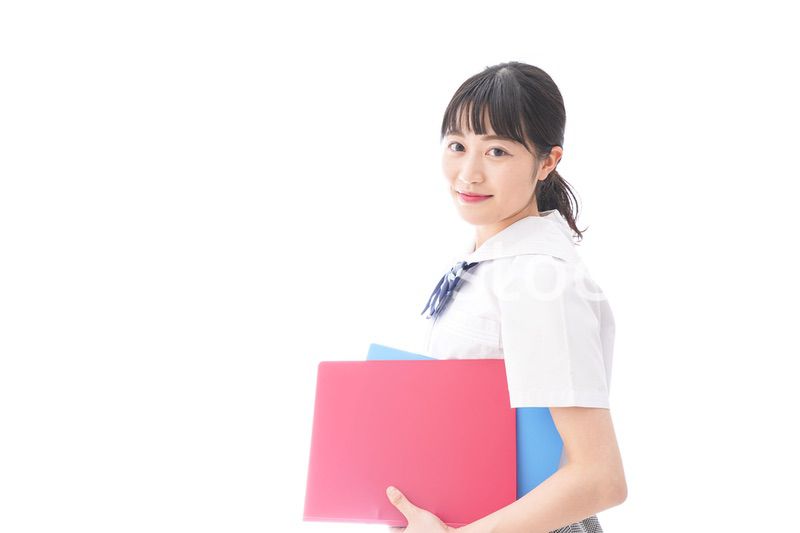 テキストを持つ学生