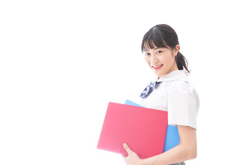 テキストを持つ学生