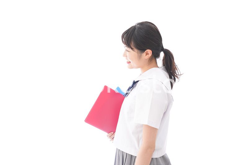 テキストを持つ学生