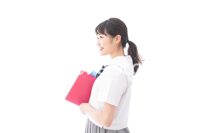 テキストを持つ学生