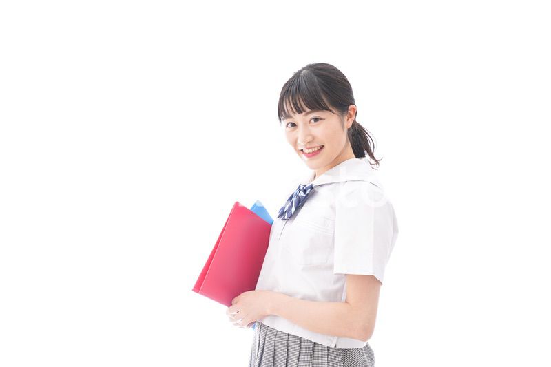 テキストを持つ学生