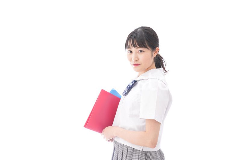 テキストを持つ学生