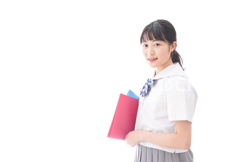テキストを持つ学生