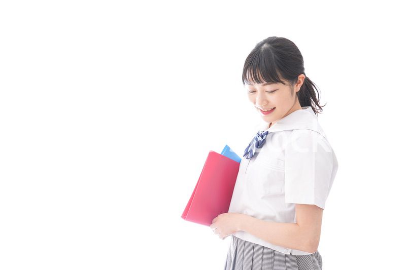 テキストを持つ学生