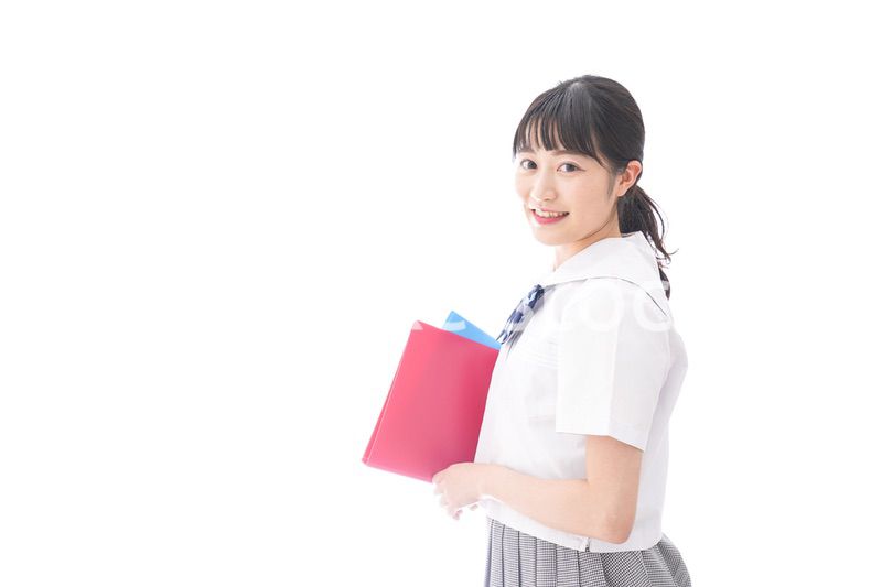 テキストを持つ学生