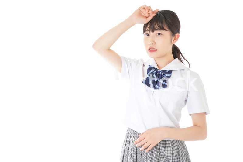 頭痛に苦しむ若い女子学生