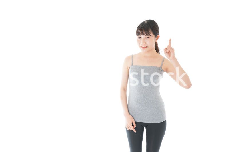 スポーツのアドバイスをする若い女性