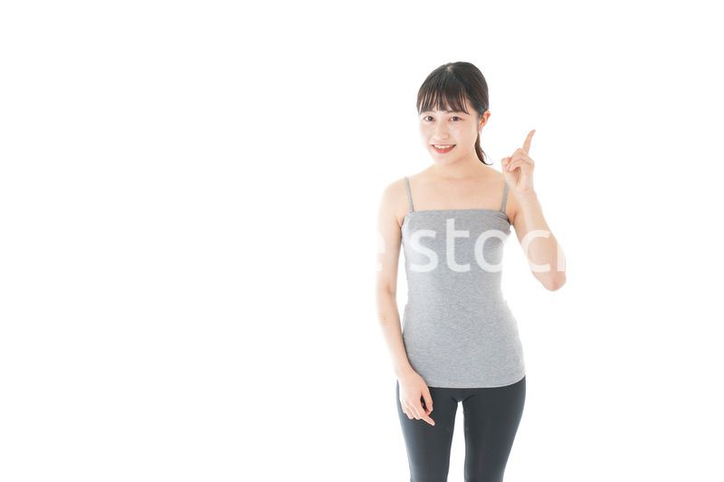 スポーツのアドバイスをする若い女性