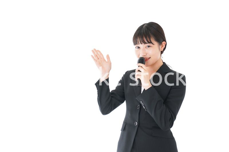 ポイントを示すスーツを着たビジネスウーマン