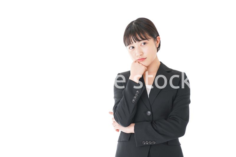 悩むビジネスウーマン