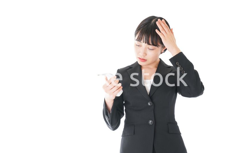 風邪をひいた若いビジネスウーマン