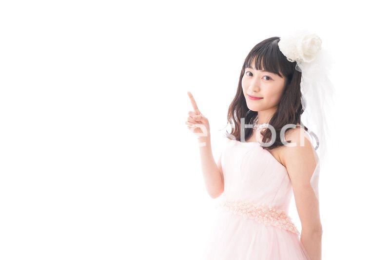 ポイントを指差す若い花嫁