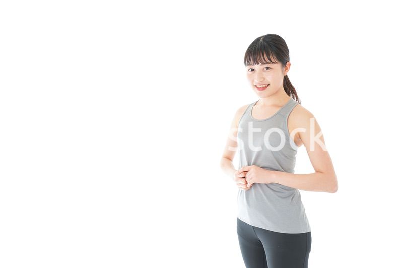 スポーツウェアを着た若い女性