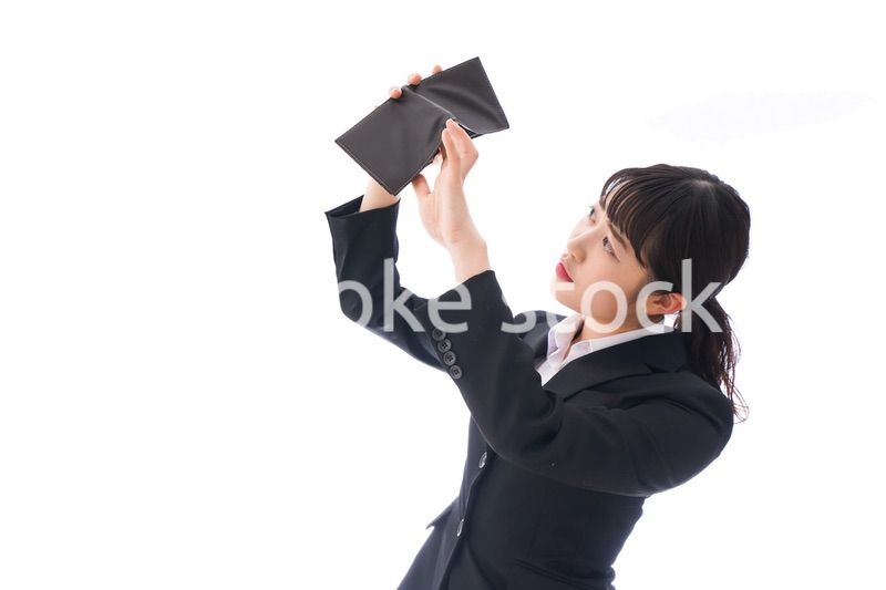 貧困に陥る若いビジネスウーマン