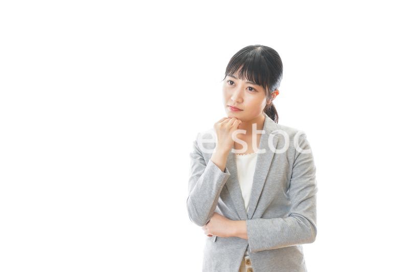 悩むビジネスウーマン