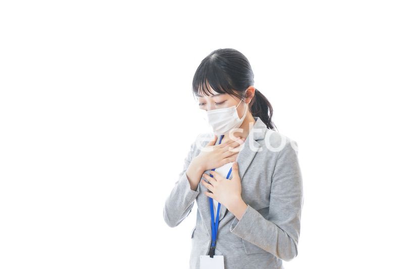 熱に苦しむ若いビジネスパーソン