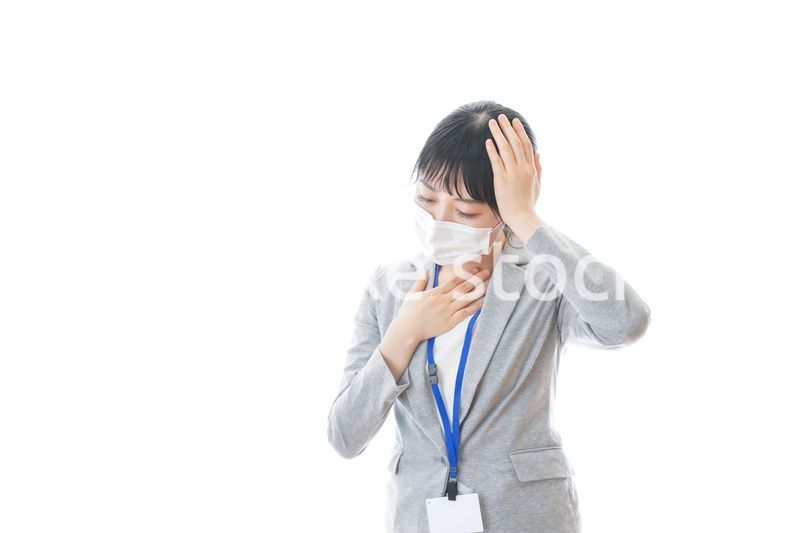 熱に苦しむ若いビジネスパーソン