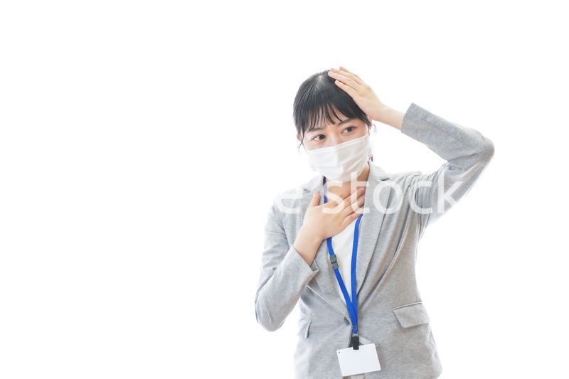 熱に苦しむ若いビジネスパーソン