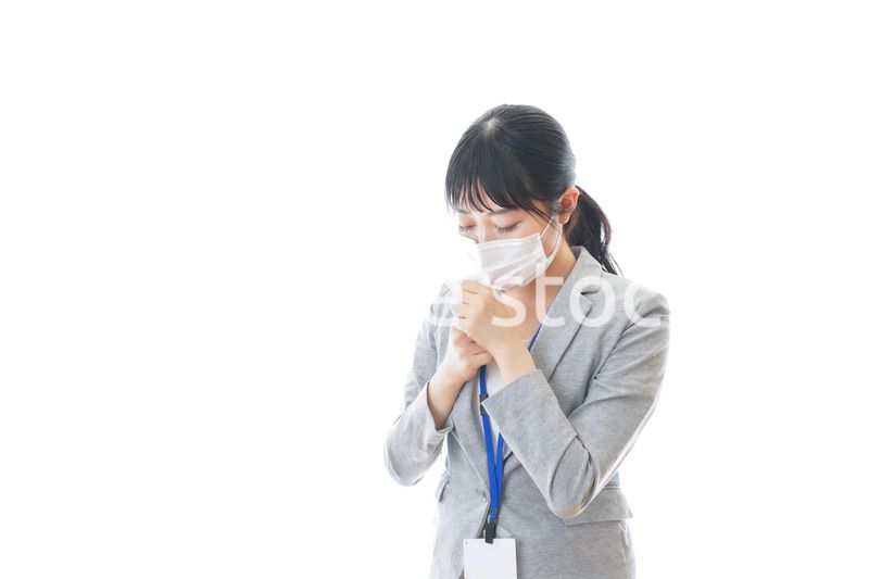 熱に苦しむ若いビジネスパーソン