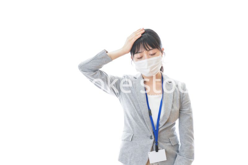 熱に苦しむ若いビジネスパーソン