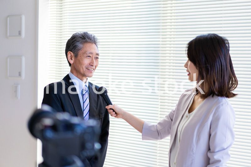 インタビューに答える社長