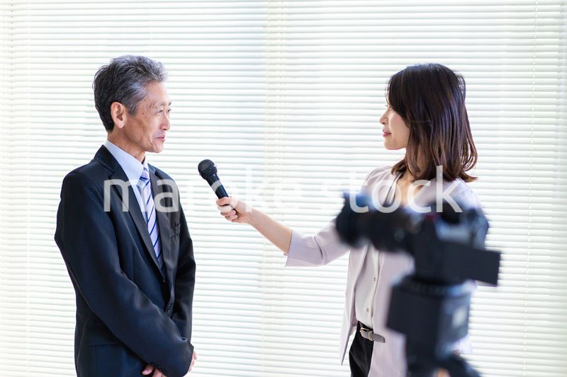 インタビューに答える社長