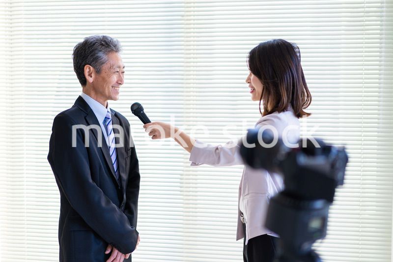 インタビューに答える社長