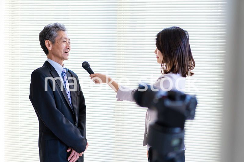 インタビューに答える社長