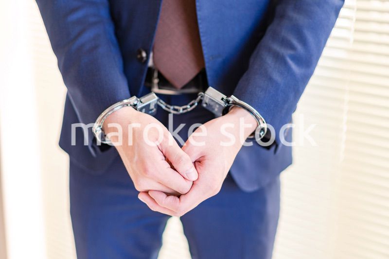 逮捕されたビジネスマン