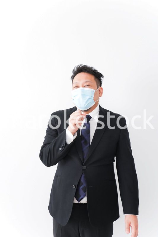 体調に不安を感じるビジネスマン