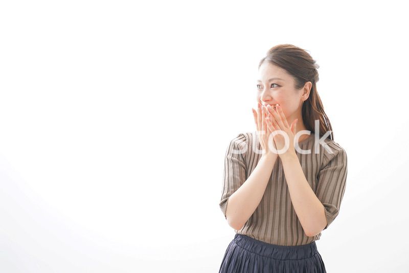 大喜びする若いビジネスウーマン