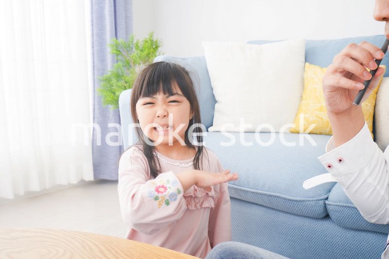 副流煙を嫌う小さな女の子