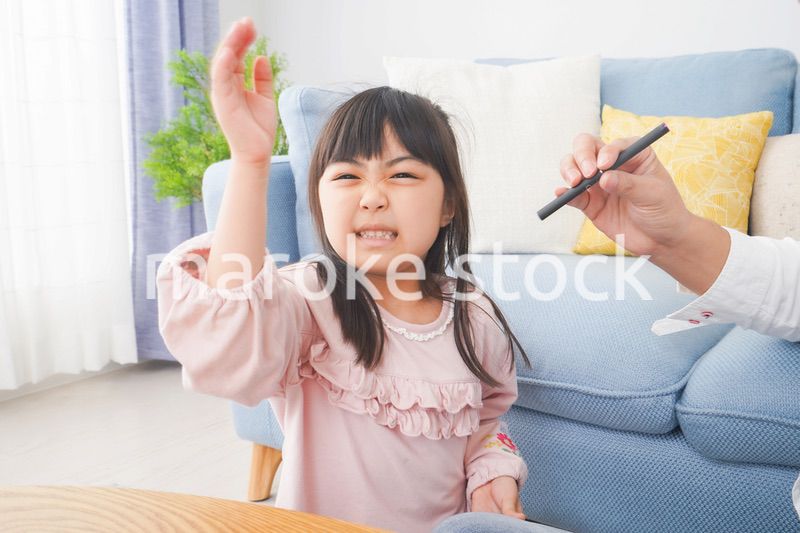 副流煙を嫌う小さな女の子