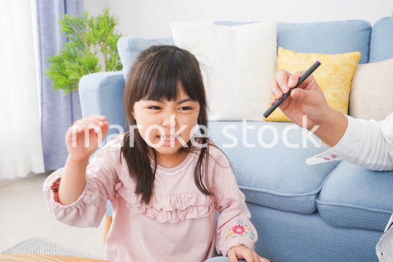 副流煙を嫌う小さな女の子